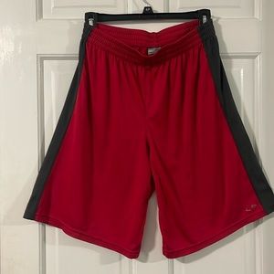 Champion boys size XL (16/18) red athletic shorts. 100% polyester. Like new.